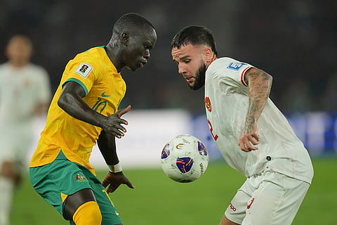 2026 FIFA World Cup Qualifying, Indonesia Australia: Calvin Verdonk, right, battles for the ball against Awer Mabil 